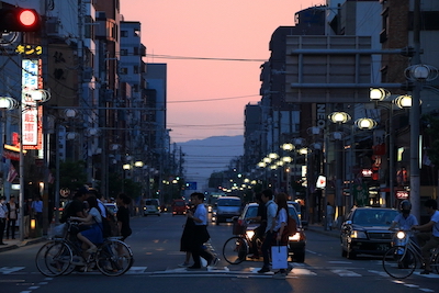 Outdoor evening city shoppers in Japan